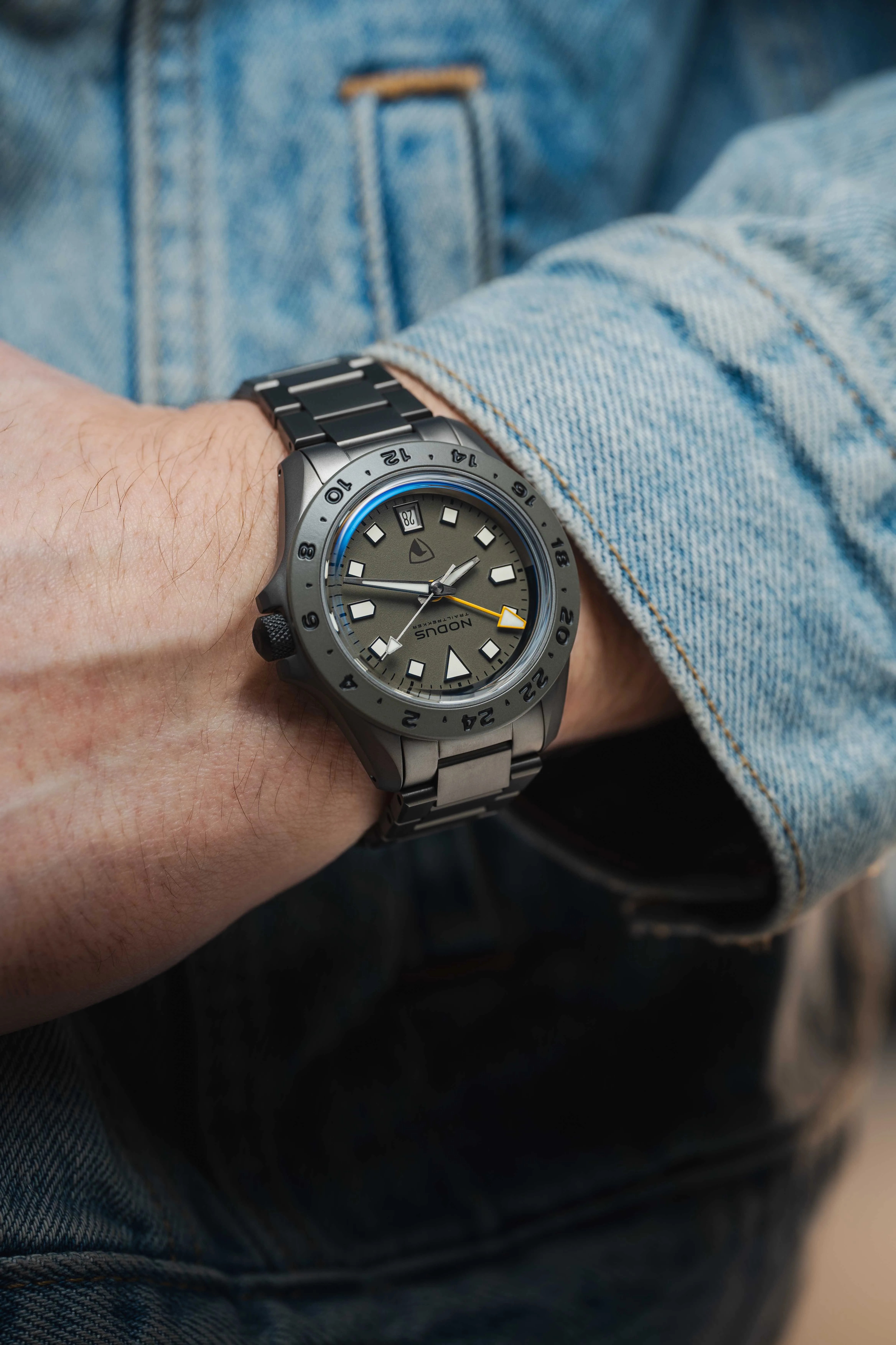 nodus x raven tool watch on a mans wrist