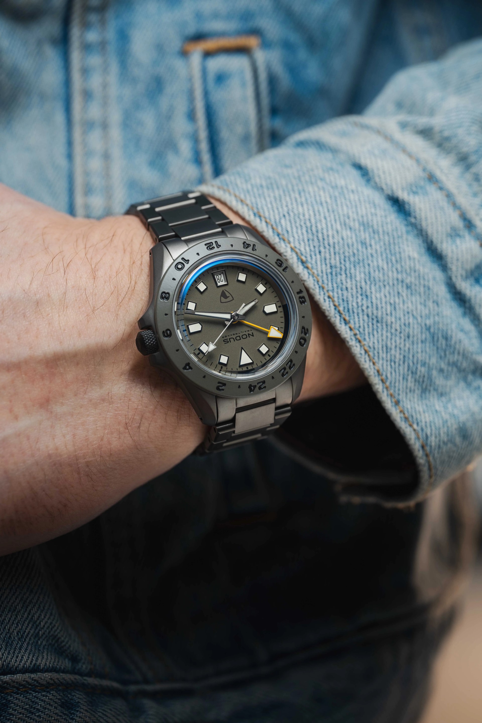 nodus x raven tool watch on a mans wrist