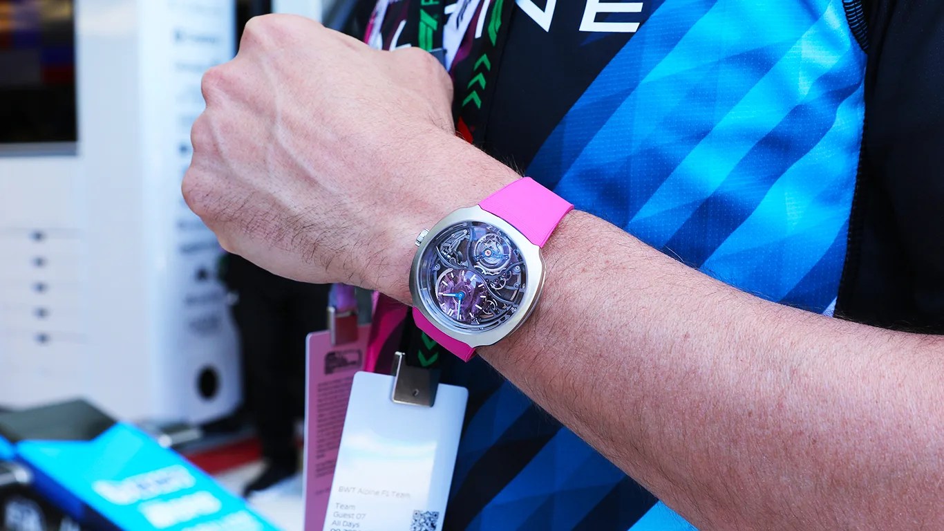 moser watch on mans wrist at an f1 race