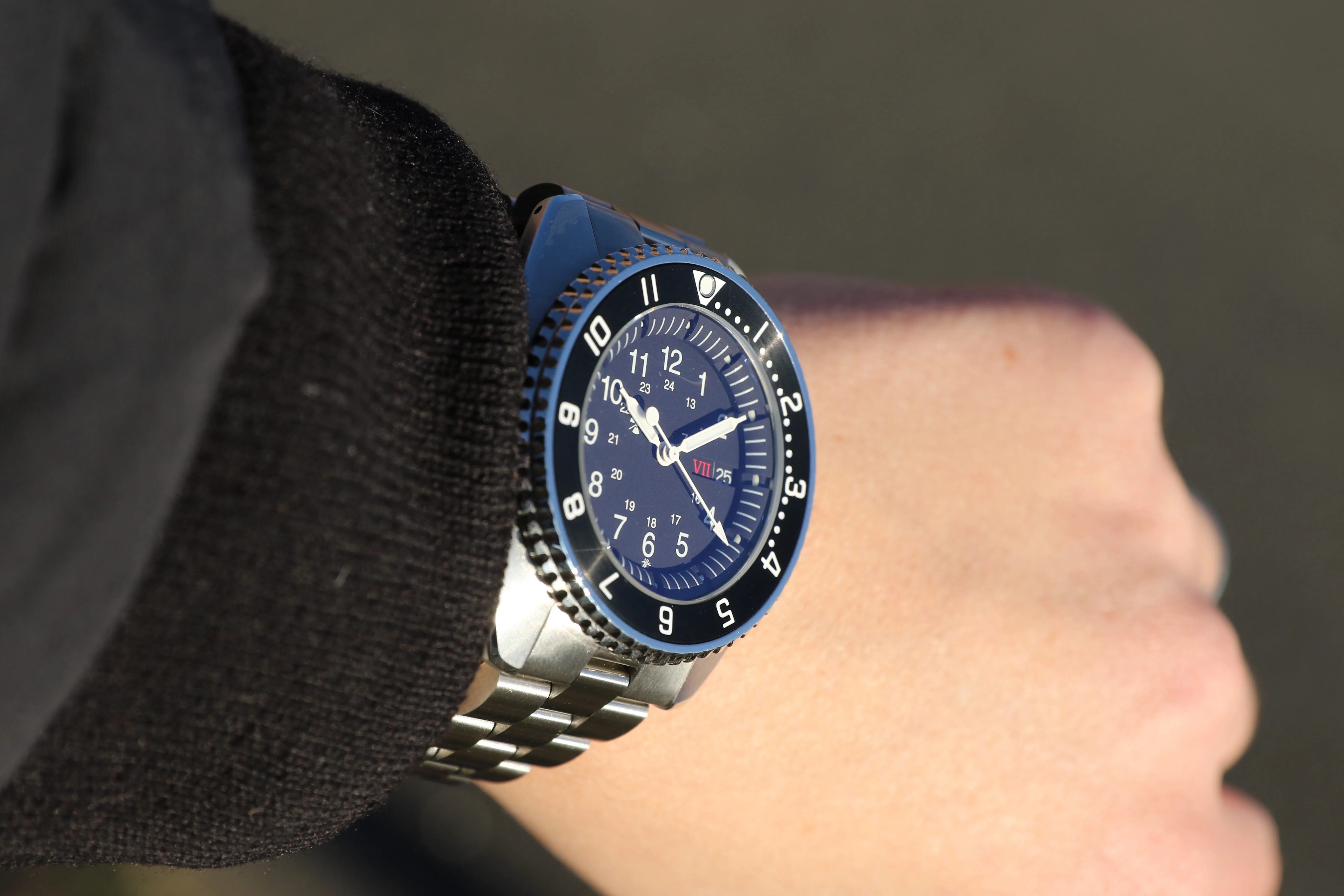 a black tornek rayville watch on a mans wrist