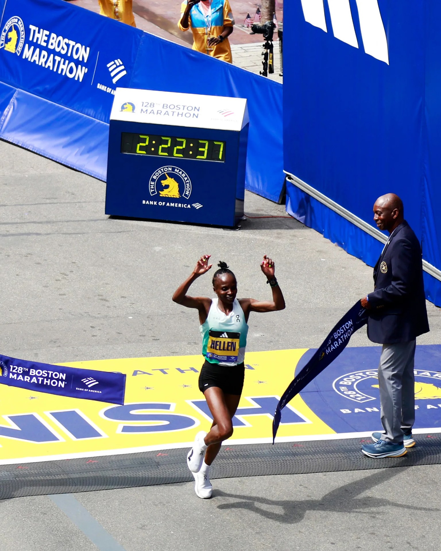 Hellen Obiri crossing the finish line of the 2024 Boston Marathon