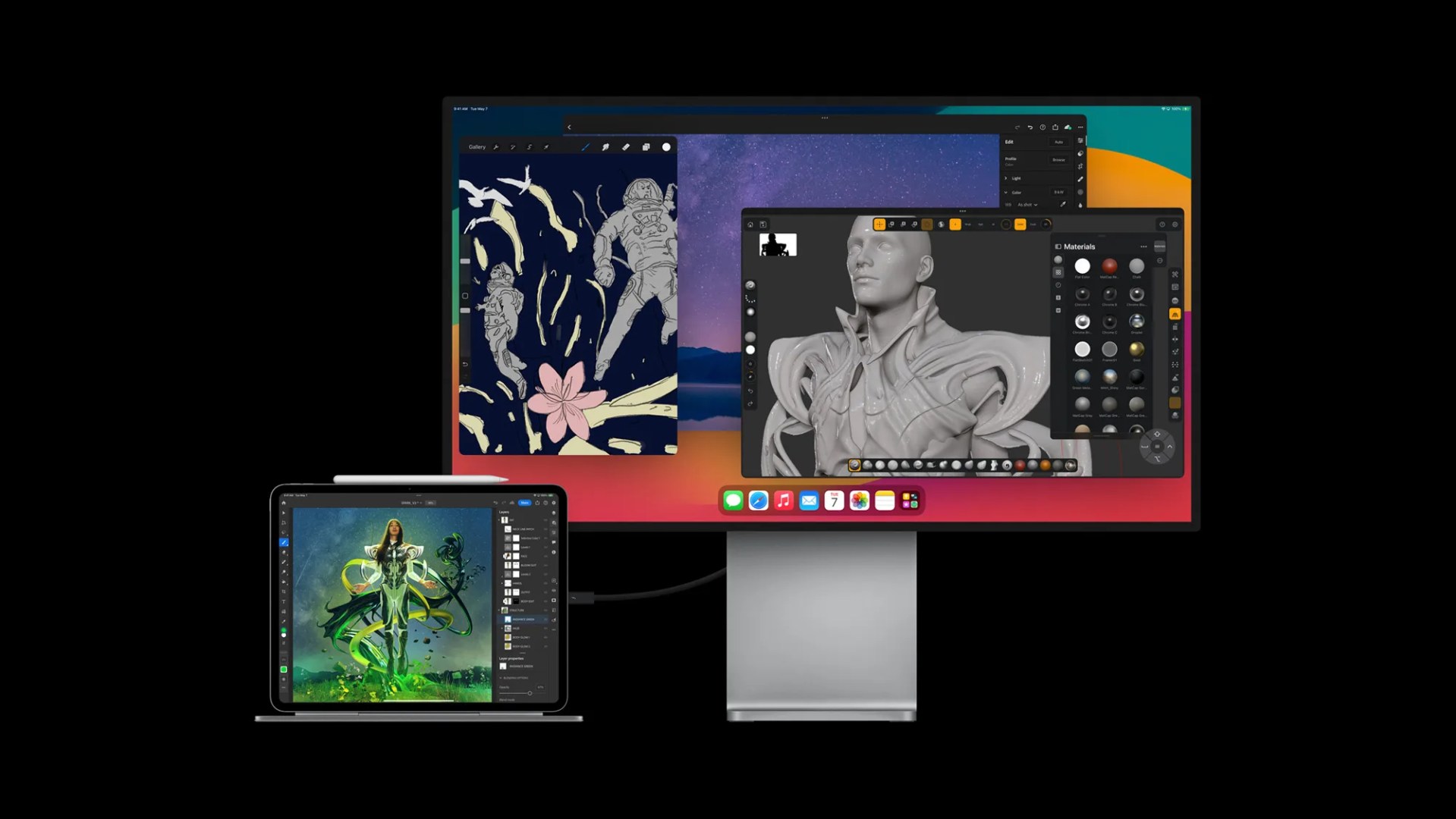 Apple's 2024 iPad Pro connected to an Apple Studio monitor on a black background.