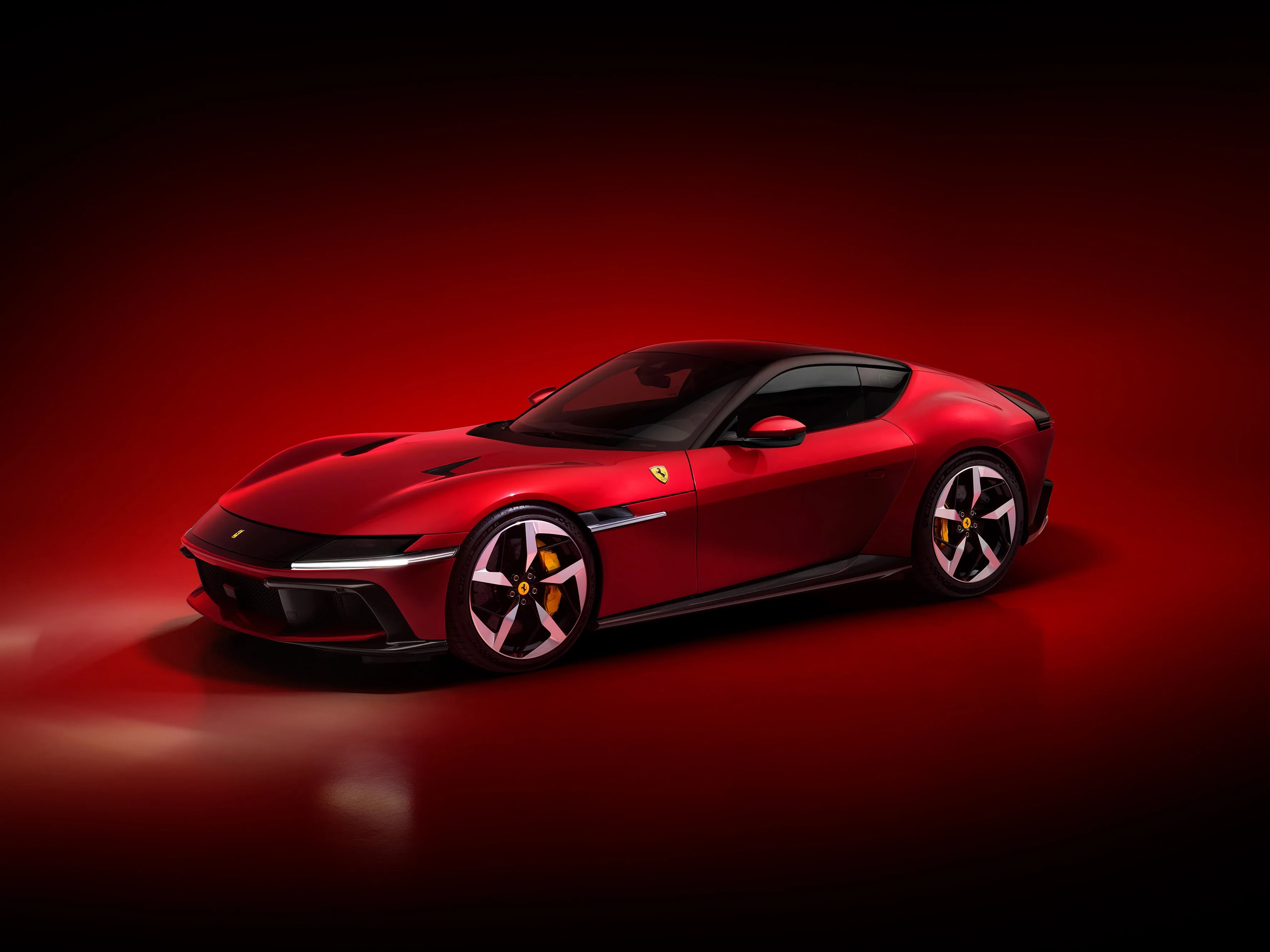 Ferrari 12Cilindri in red on red background viewed from diagonal angle
