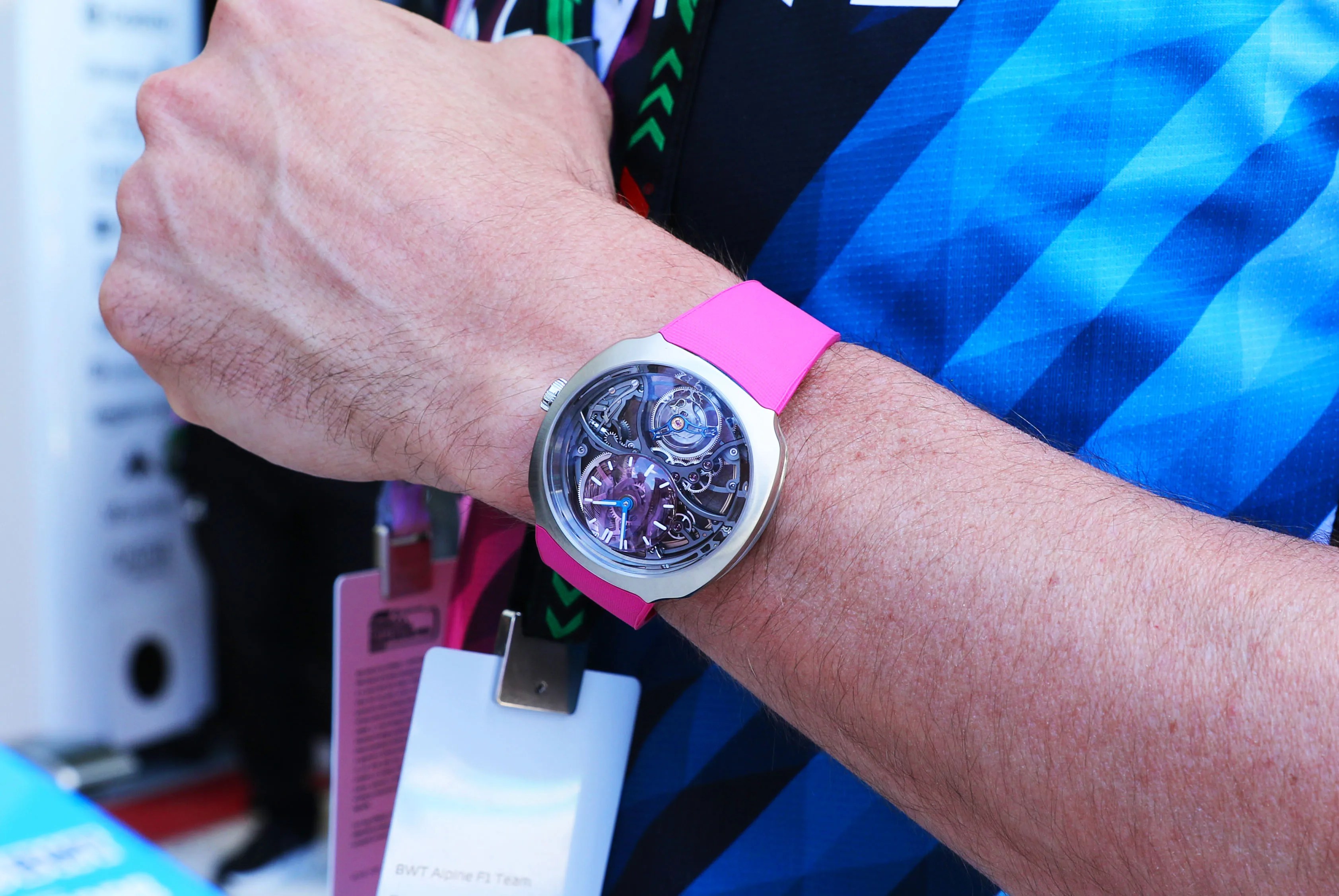 pink moser watch on mans wrist