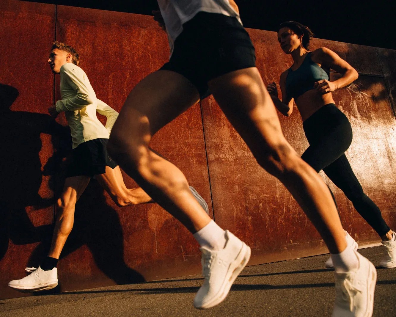 three people running