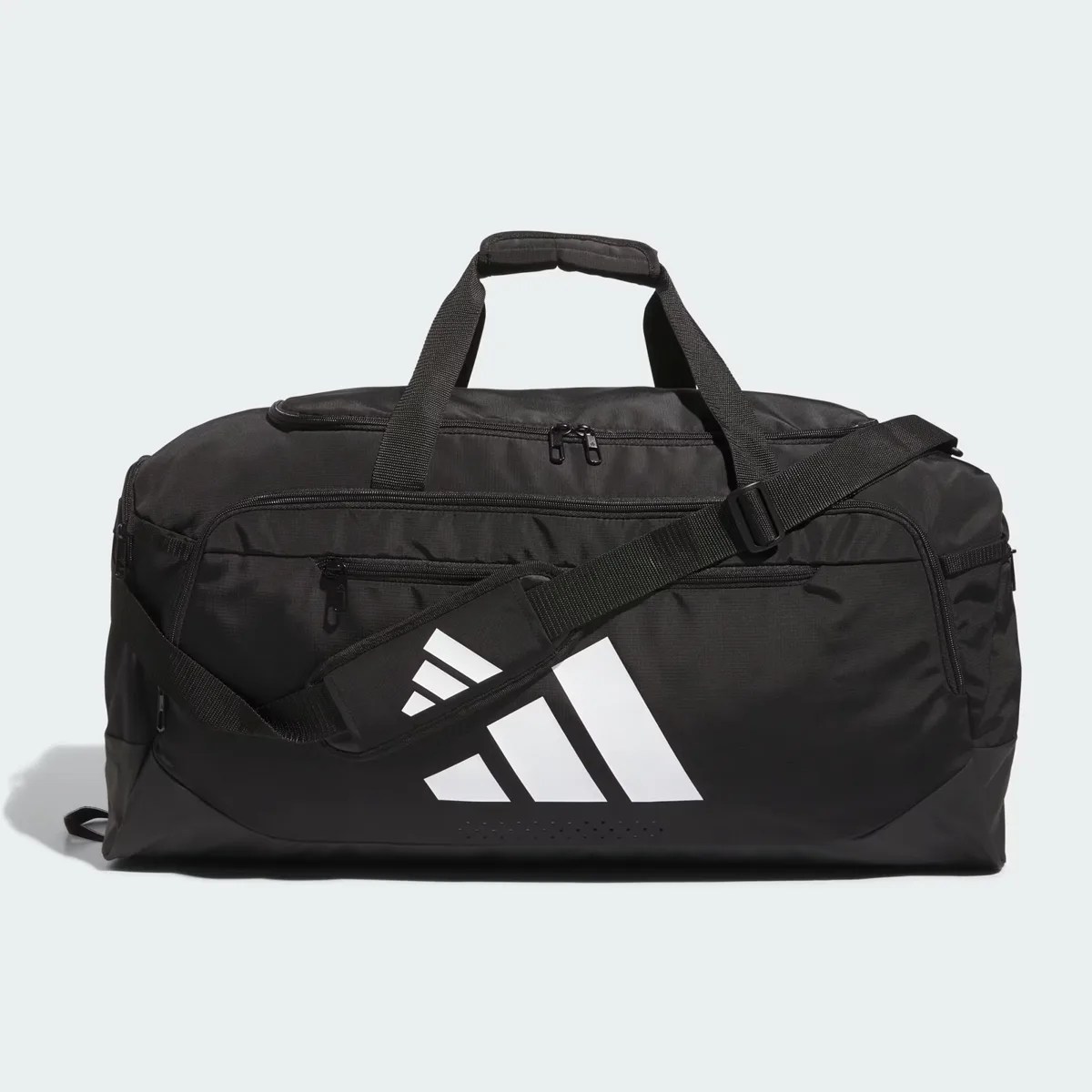 Black Adidas duffel bag with white logo and adjustable shoulder strap on a white background.