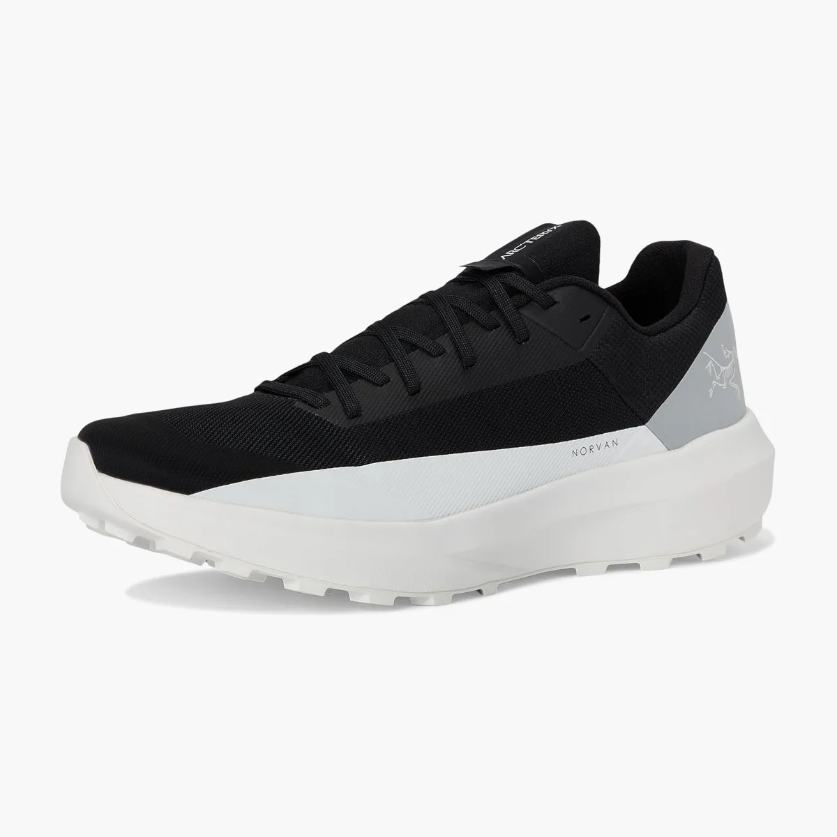 Black and gray low-top sneaker with white thick sole and laces, labeled "Norvan" on the side.