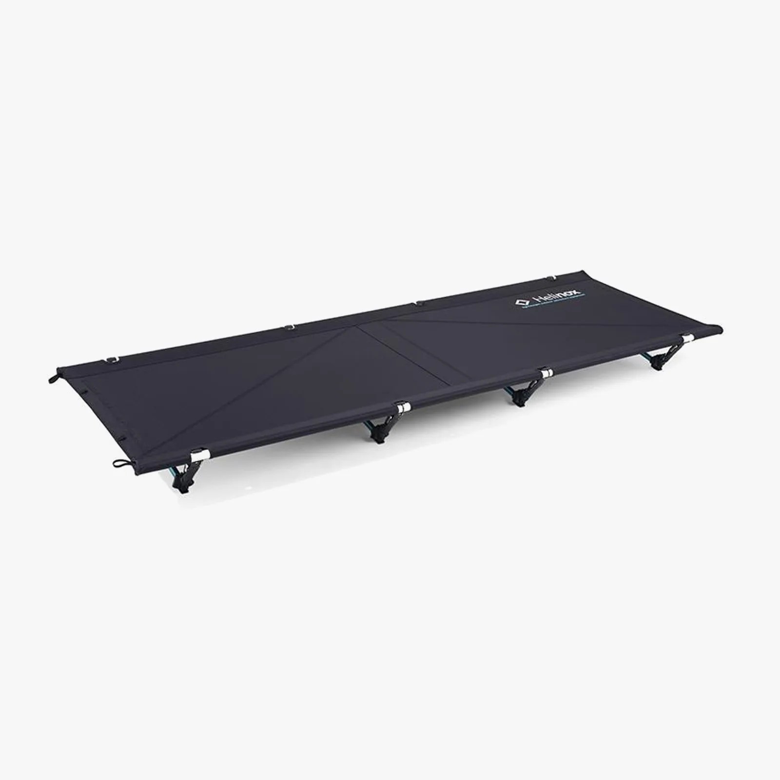 Black foldable camping cot with metal legs and fabric surface on a white background.