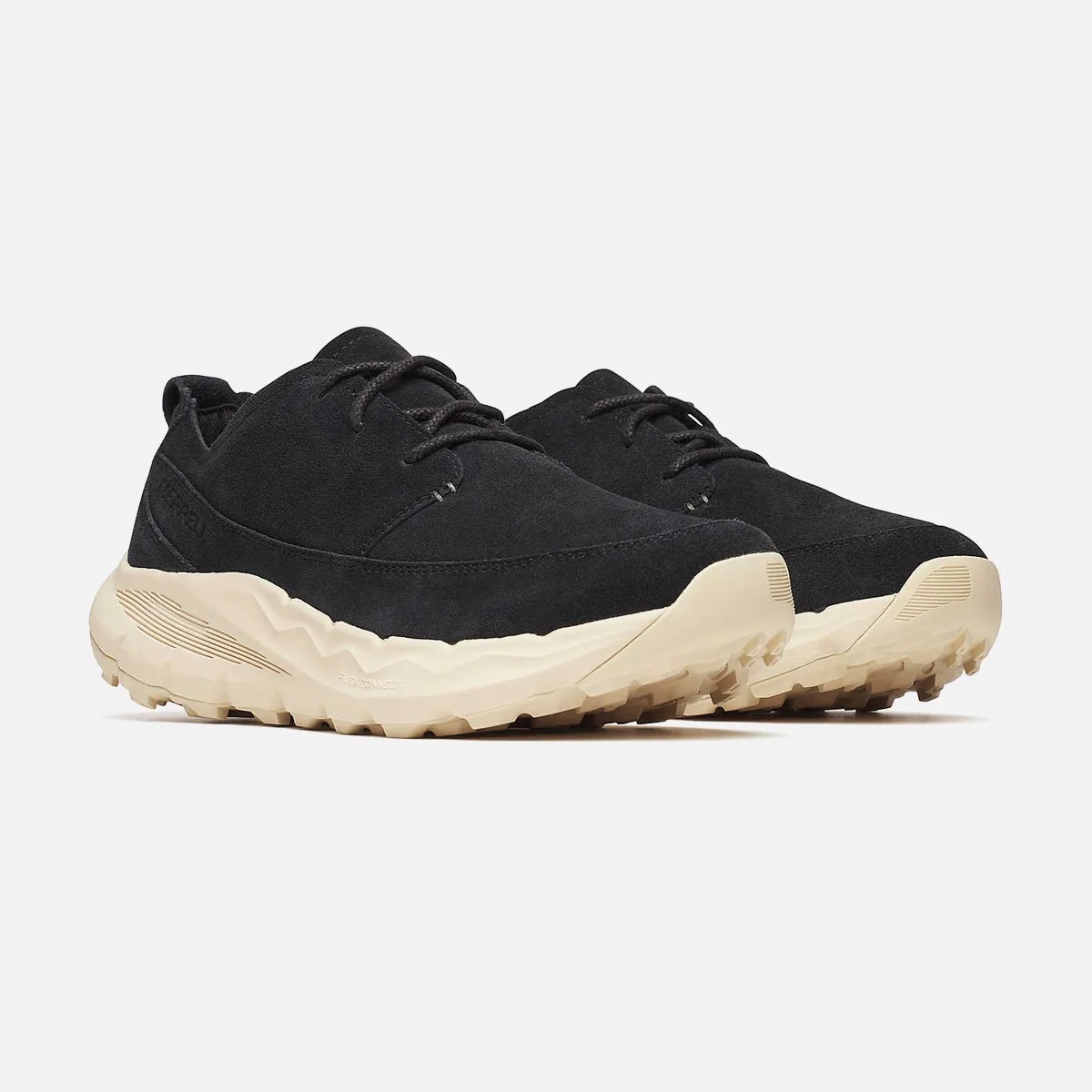 Pair of black suede sneakers with thick beige textured soles on a white background.