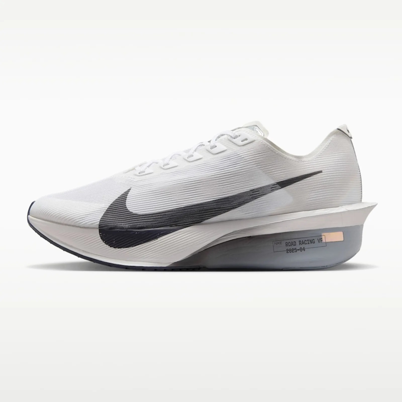 White Nike running shoe with black swoosh and thick gray sole labeled "ROAD RACING VF".