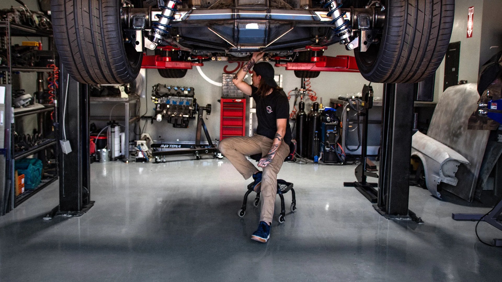 mechanic working under car