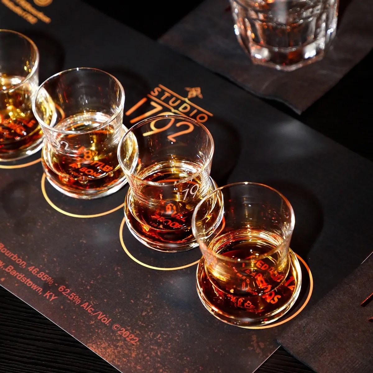 1792 bourbon in a row of tasting glasses