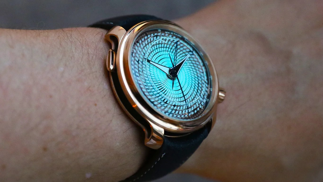 ming watch on a mans wrist