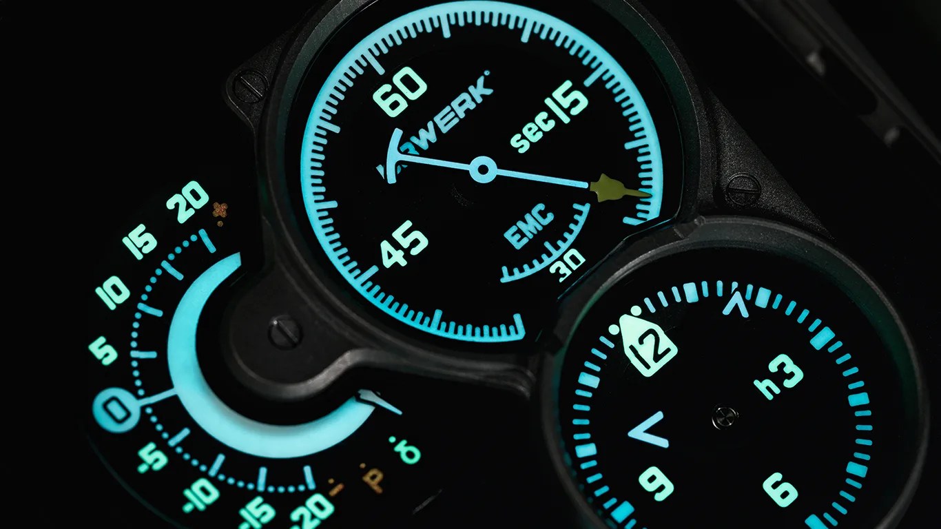 closeup of a lumed urwerk watch dial