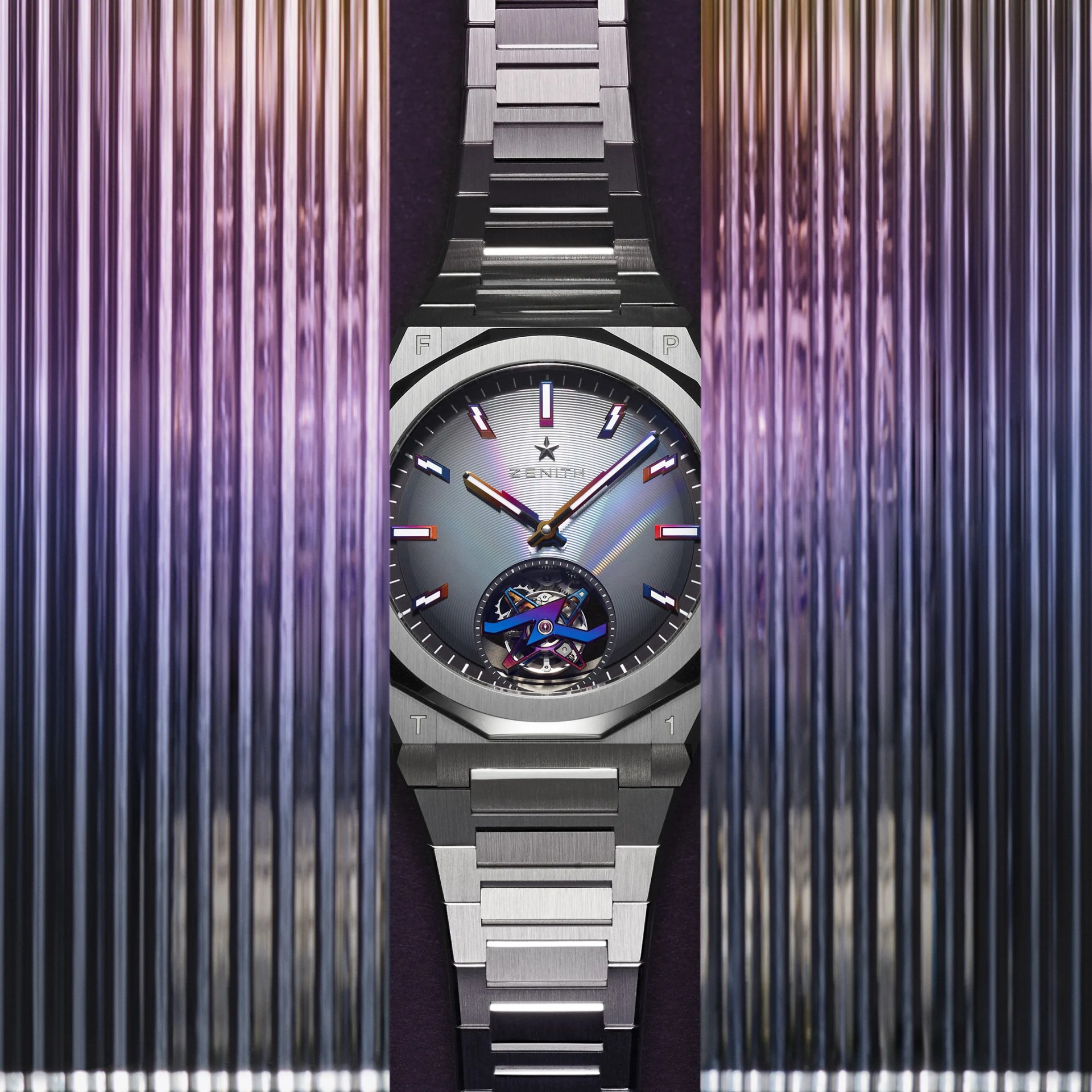 zenith watch in an iridescent display