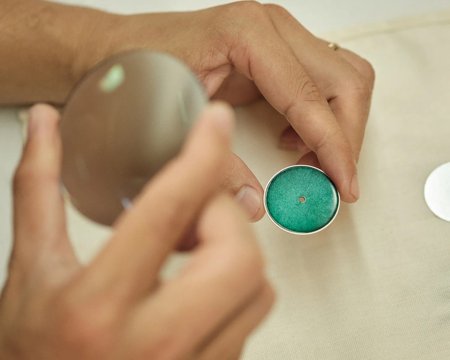 a person examines an Awake Watch dial