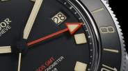 closeup of a tudor pelagos gmt tool watch dial