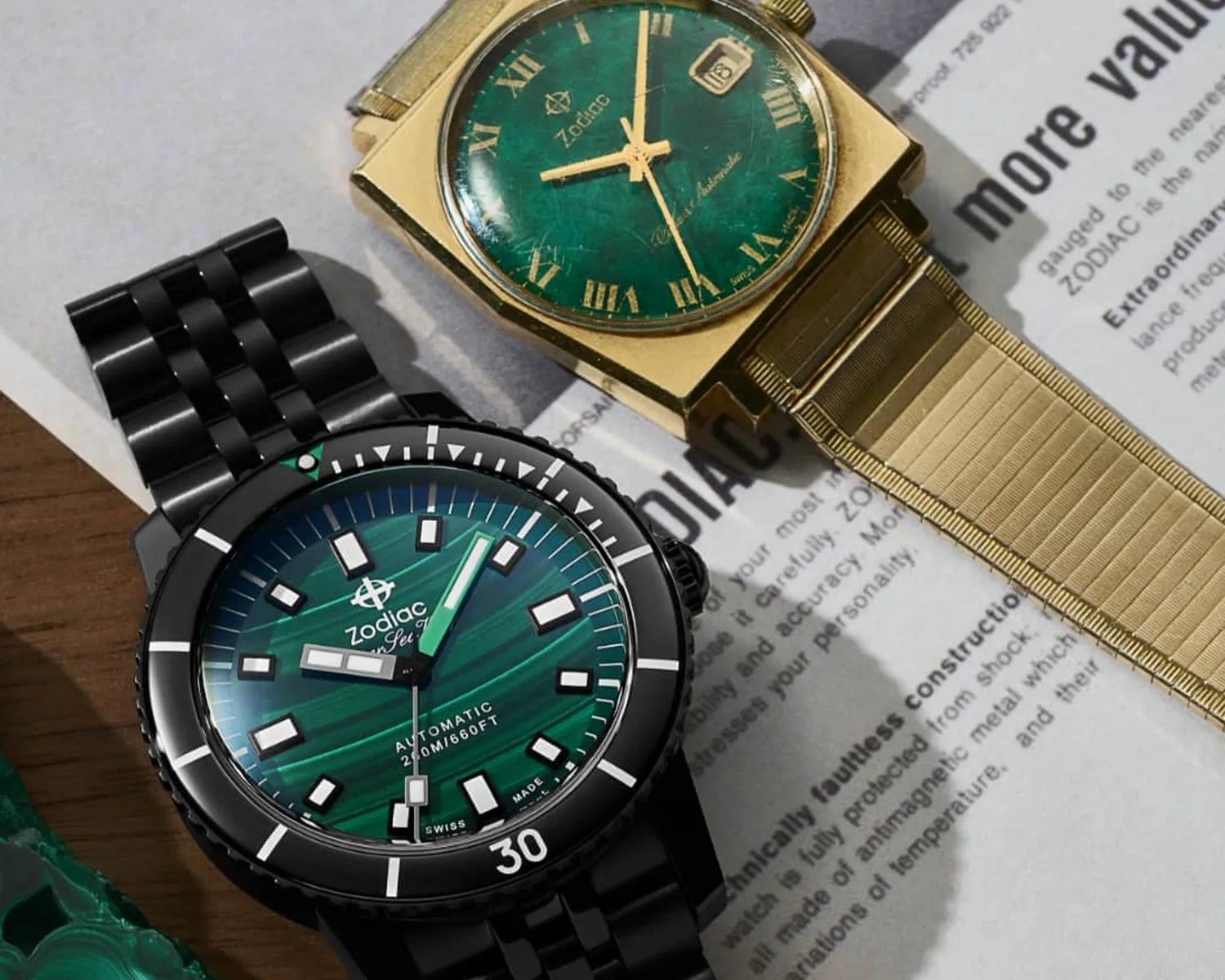 a modern zodiac watch next to a vintage one