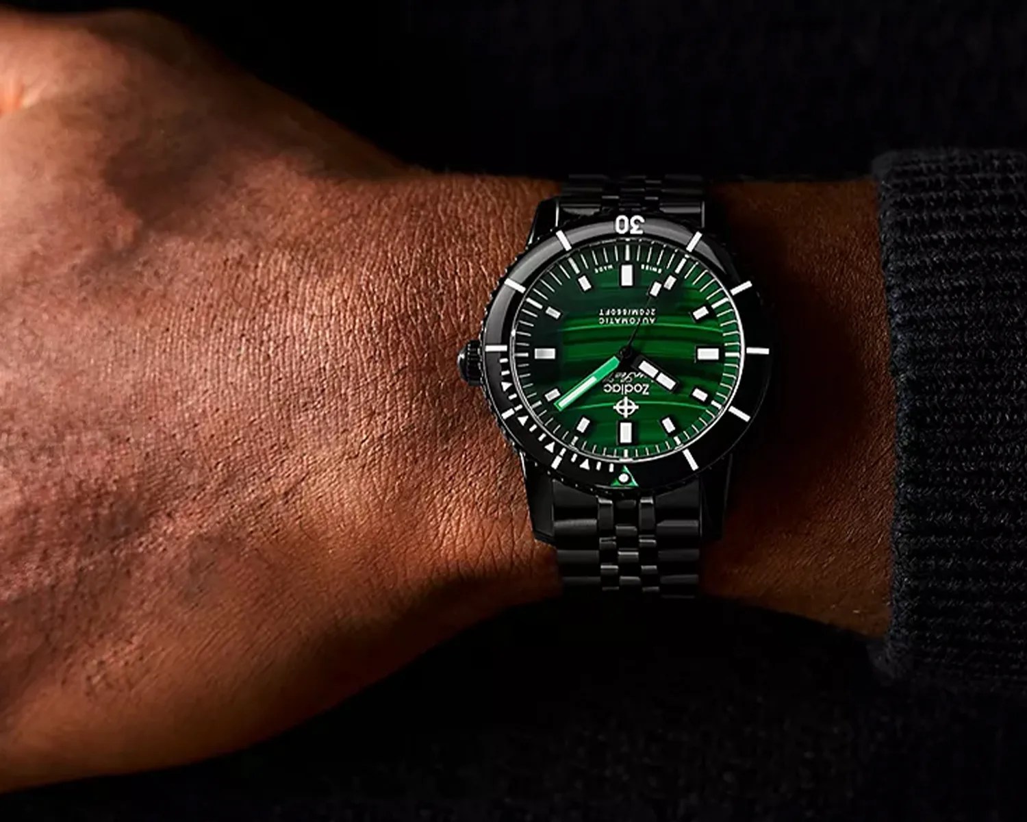 a zodiac watch on a mans wrist