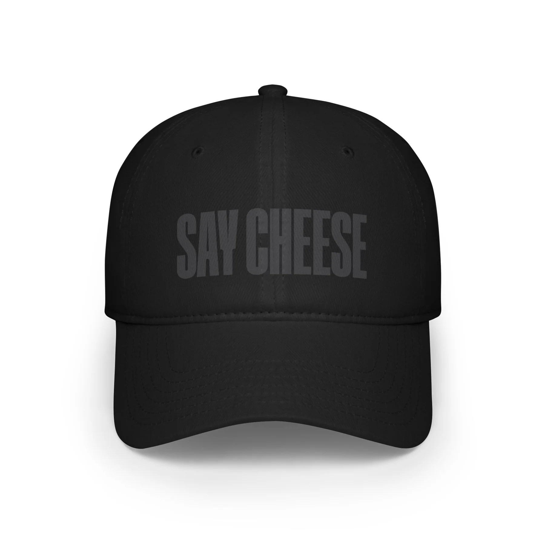 black six-panel hat that says say cheese in gray letters
