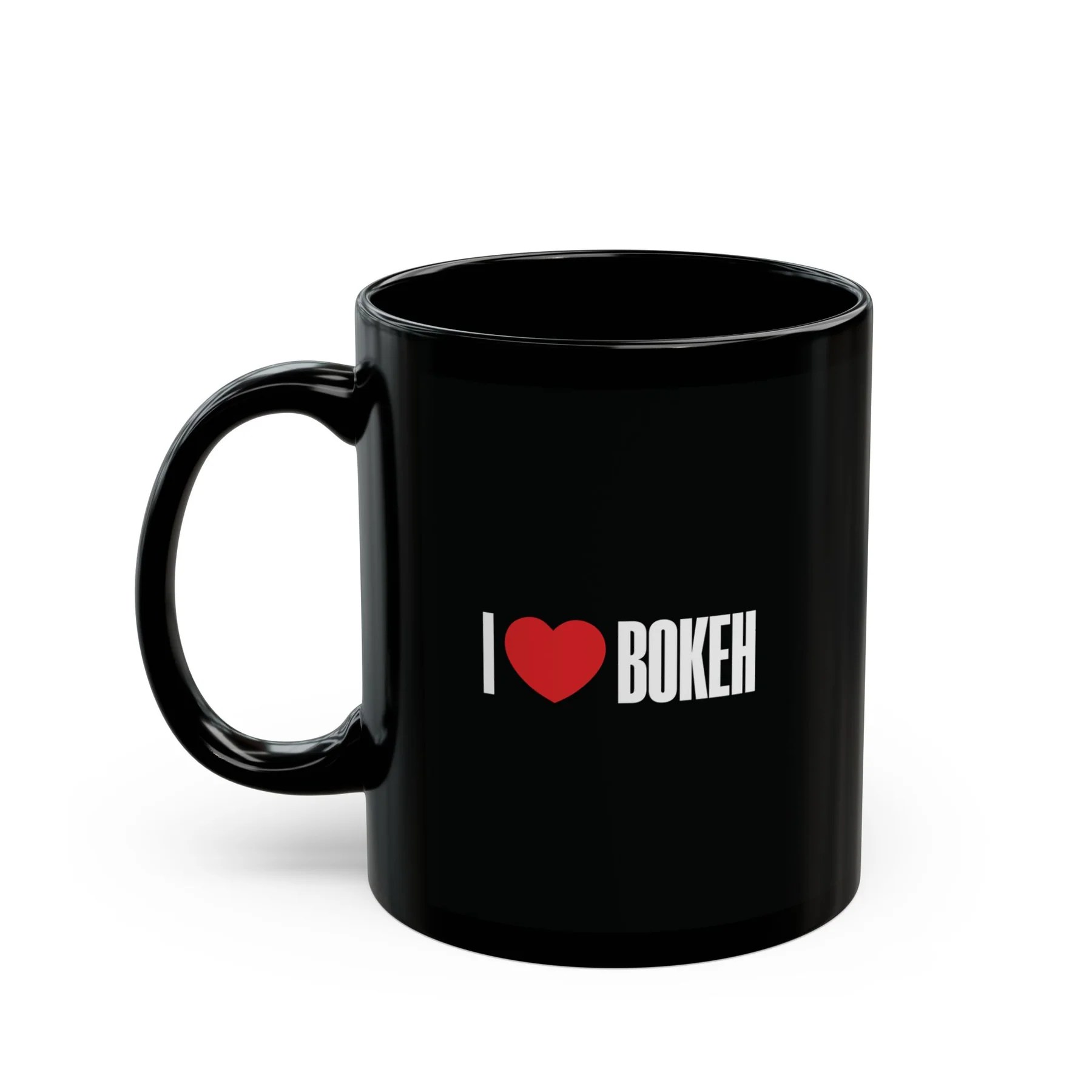 black glossy mug printed with a logo that says i heart boken