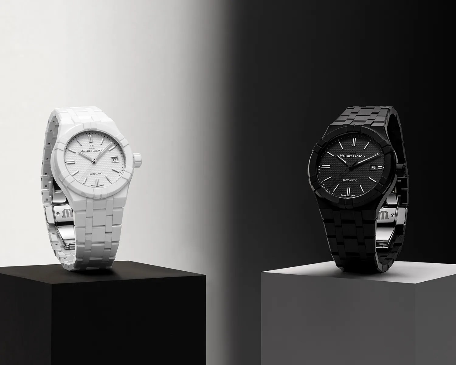 two ceramic maurice lacroix watches on pedestals