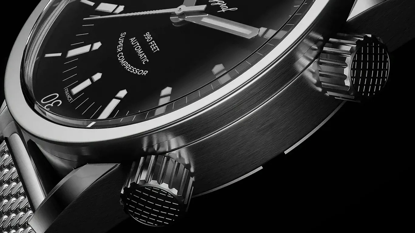 a closeup of the crowns on a yema super compressor dive watch