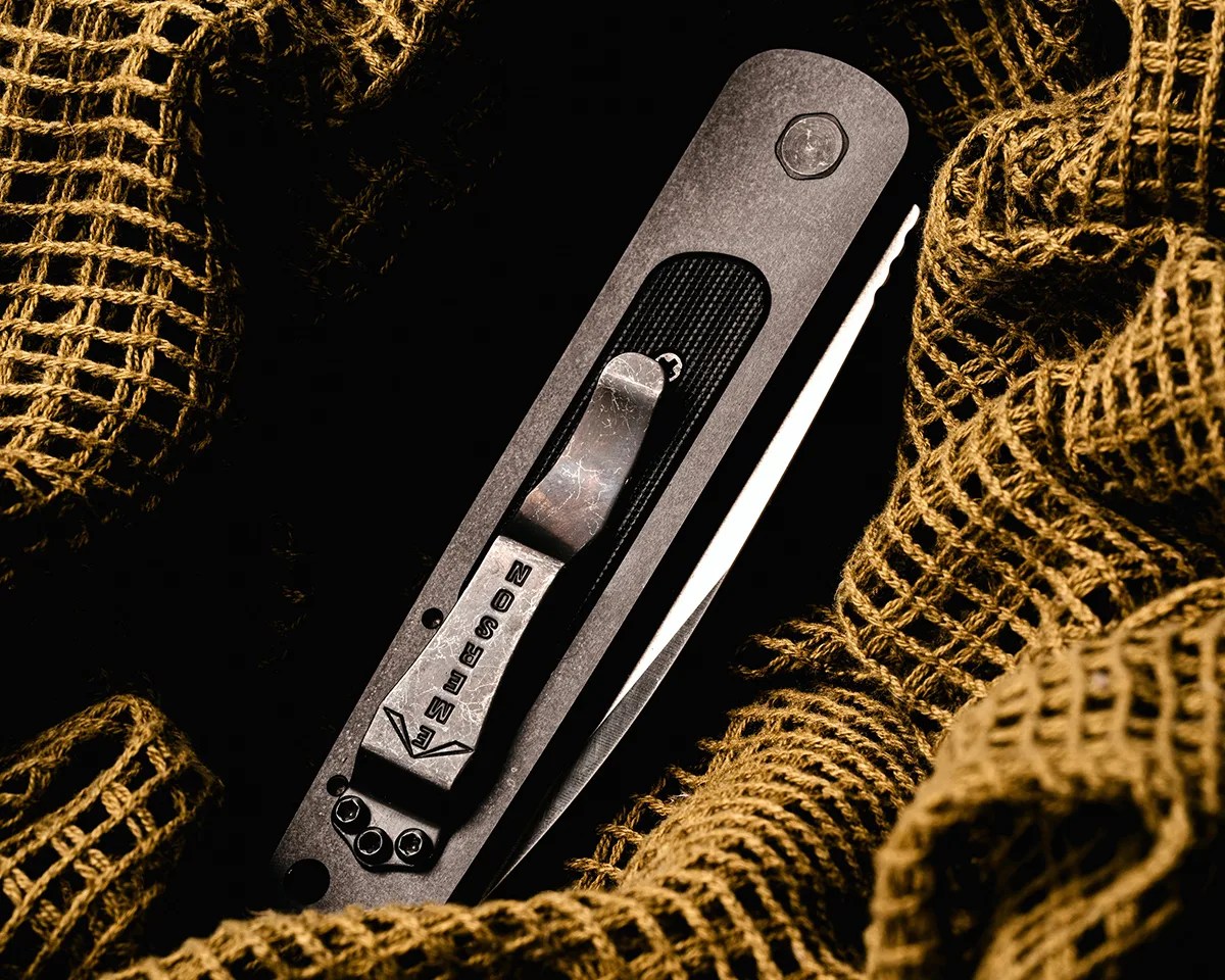 Emerson A 100 Automatic knife closed on some mesh cloth