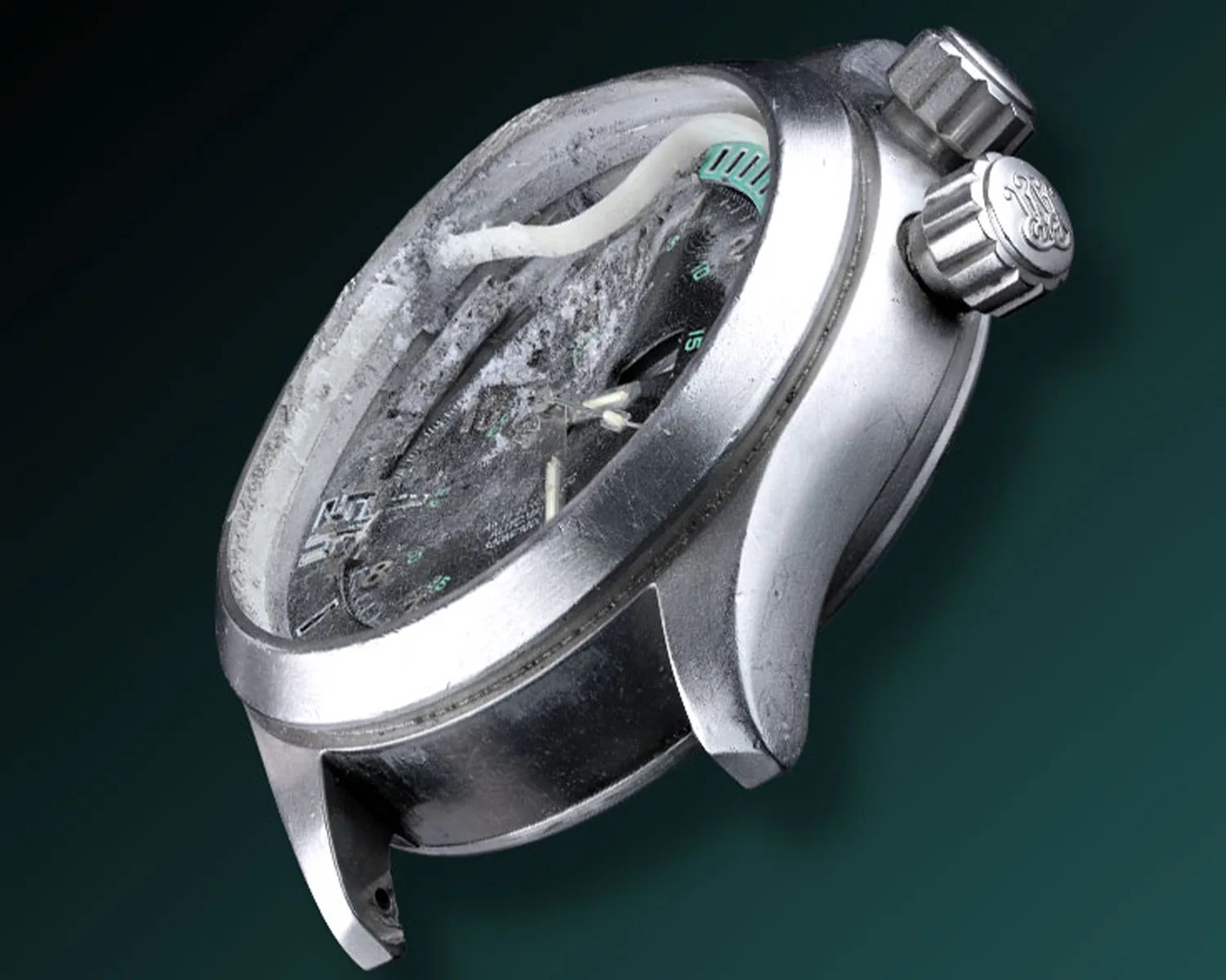 a ball dive watch that has been damaged by a bullet