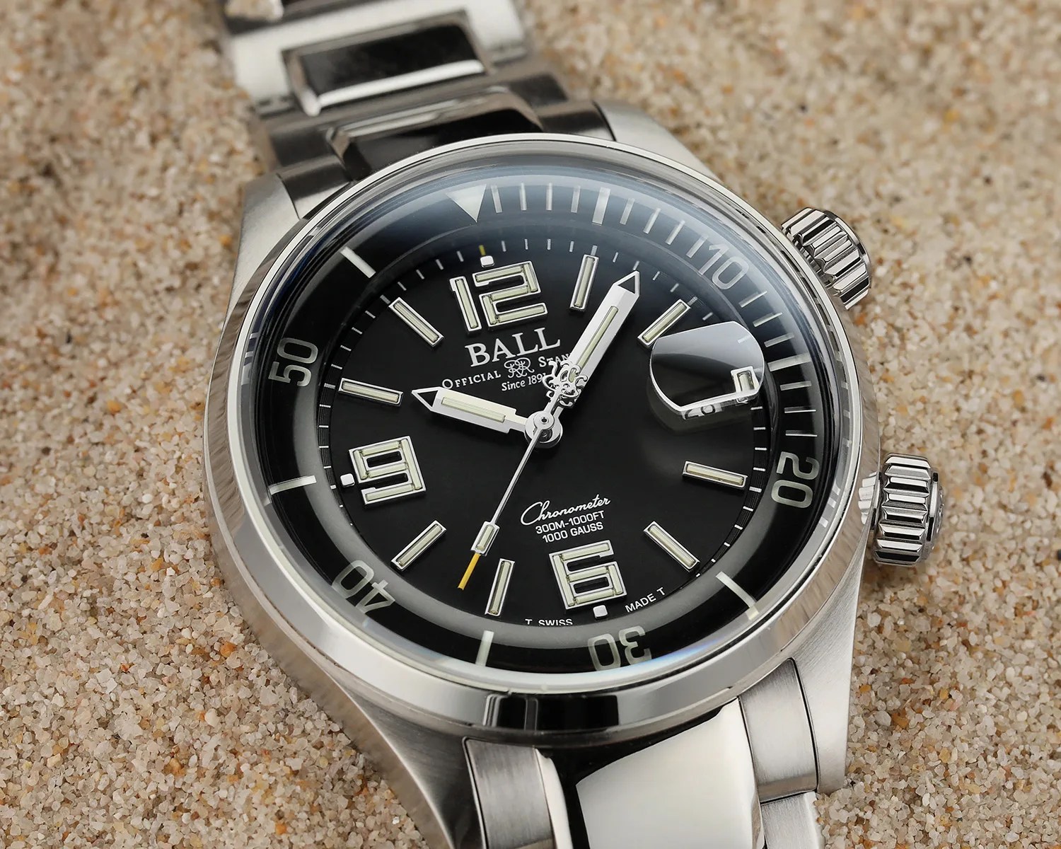 a ball dive watch on sand