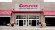 shoppers outside costco storefront