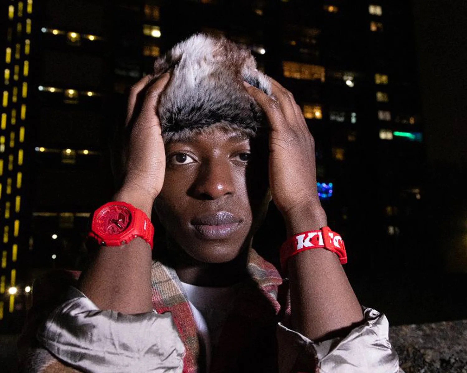 a man wears two g shock kfc watches