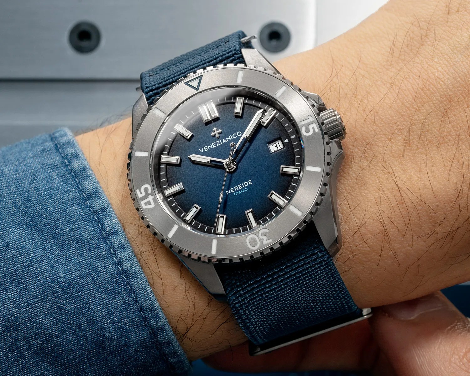 a venezianico titanium dive watch on a mans wrist