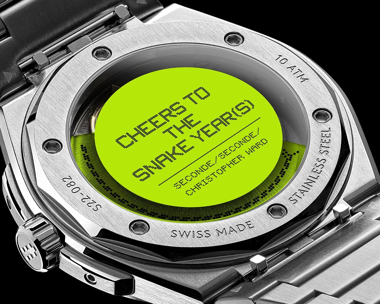 a closeup of a christopher ward watch caseback