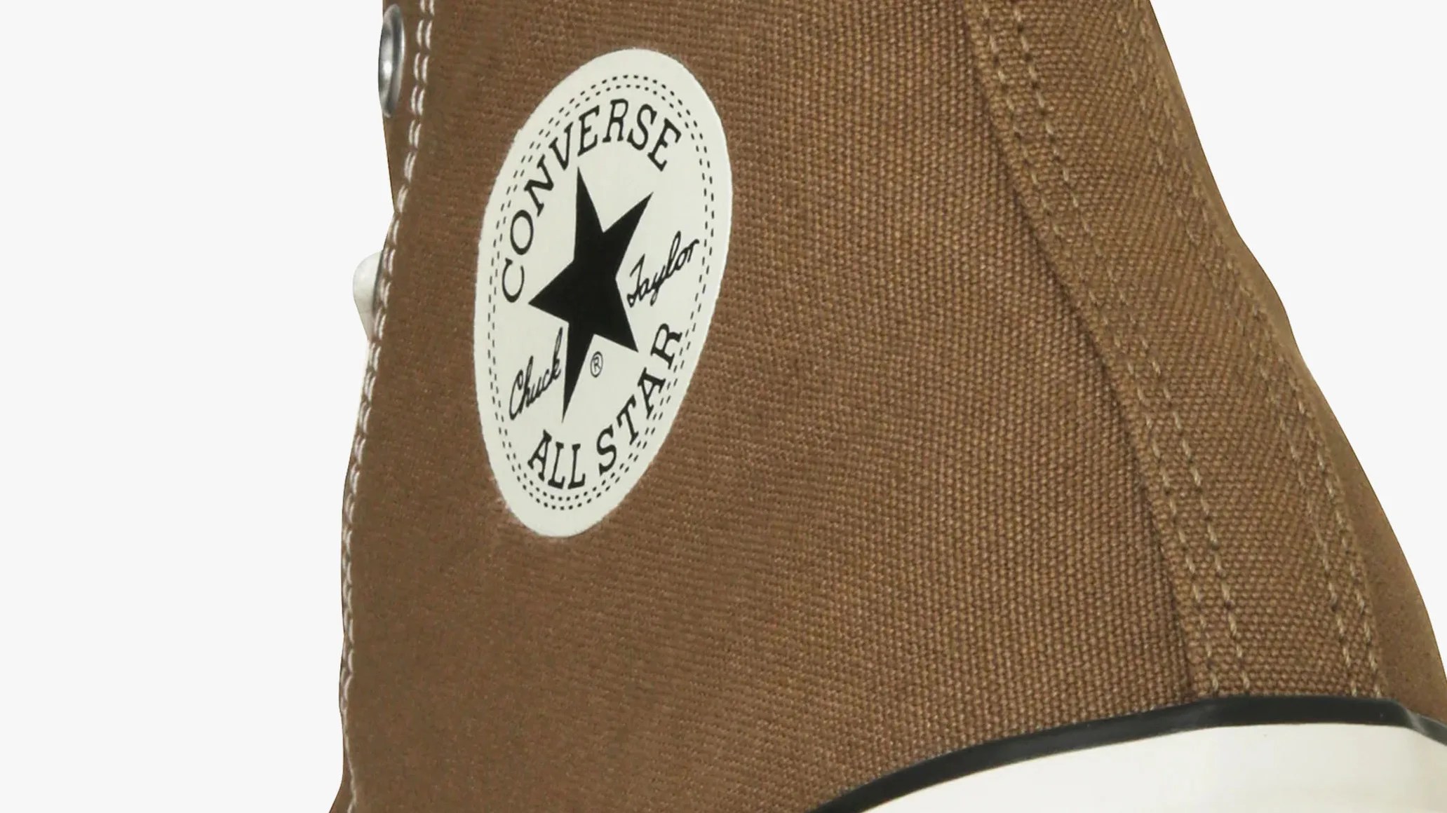 the heel of brown canvas converse all star sneaker