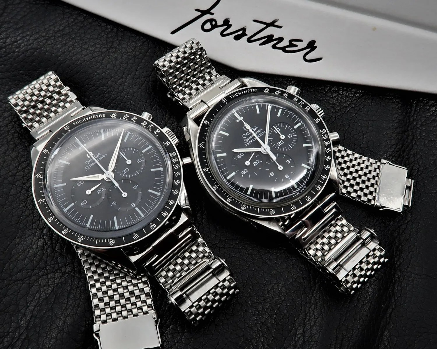 two omega speedmaster watches on forstner bracelets