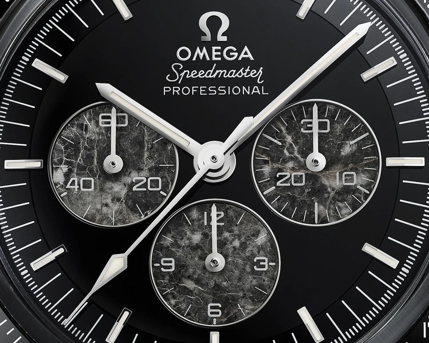 a closeup of an Omega speedmaster watch dial