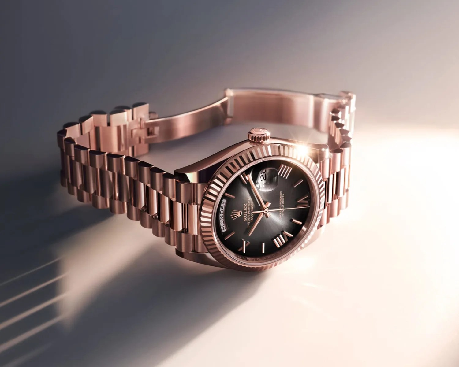 a rose gold rolex watch in sunlight