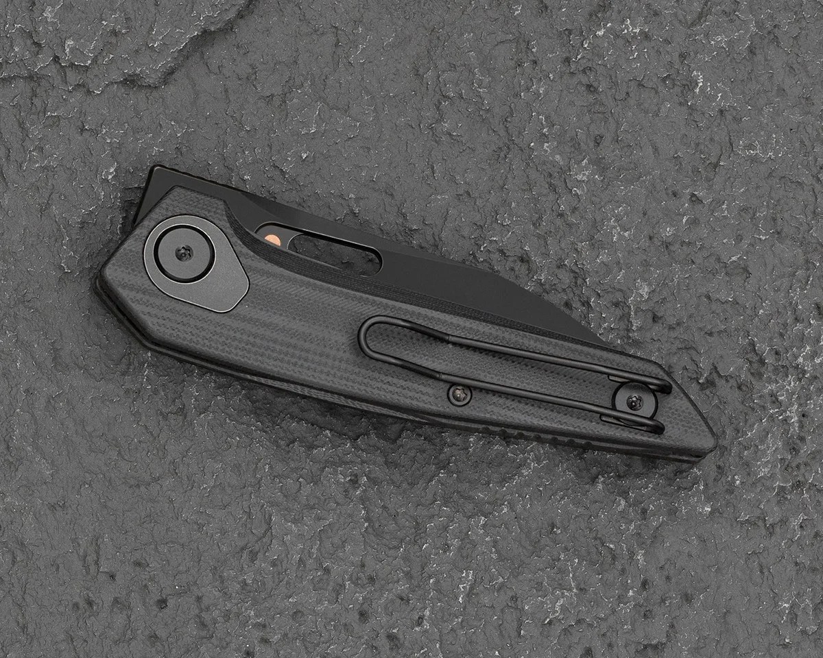 Bestech VK Void G10 knife closed on stone background