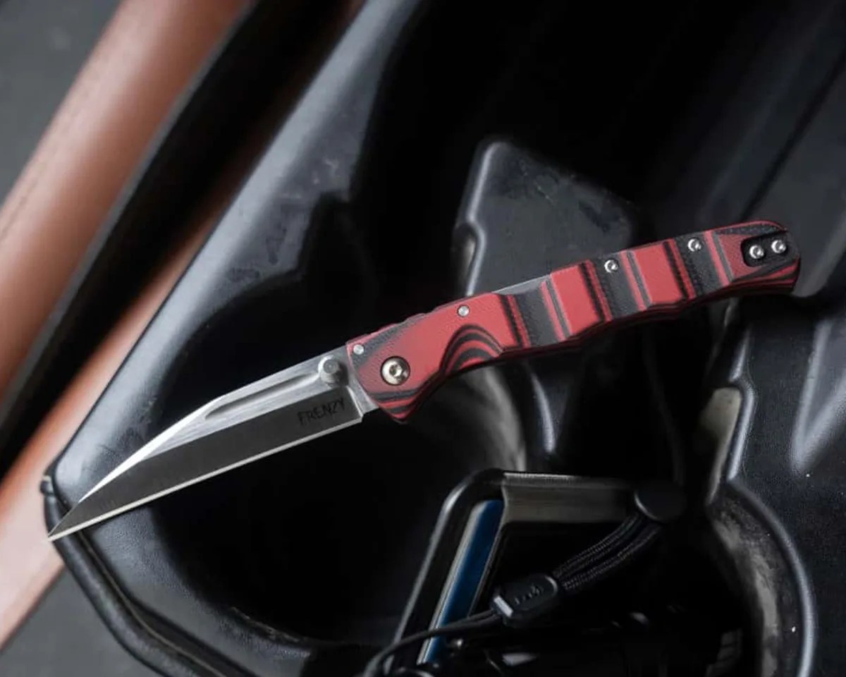 Cold Steel Frenzy II knife in car center console