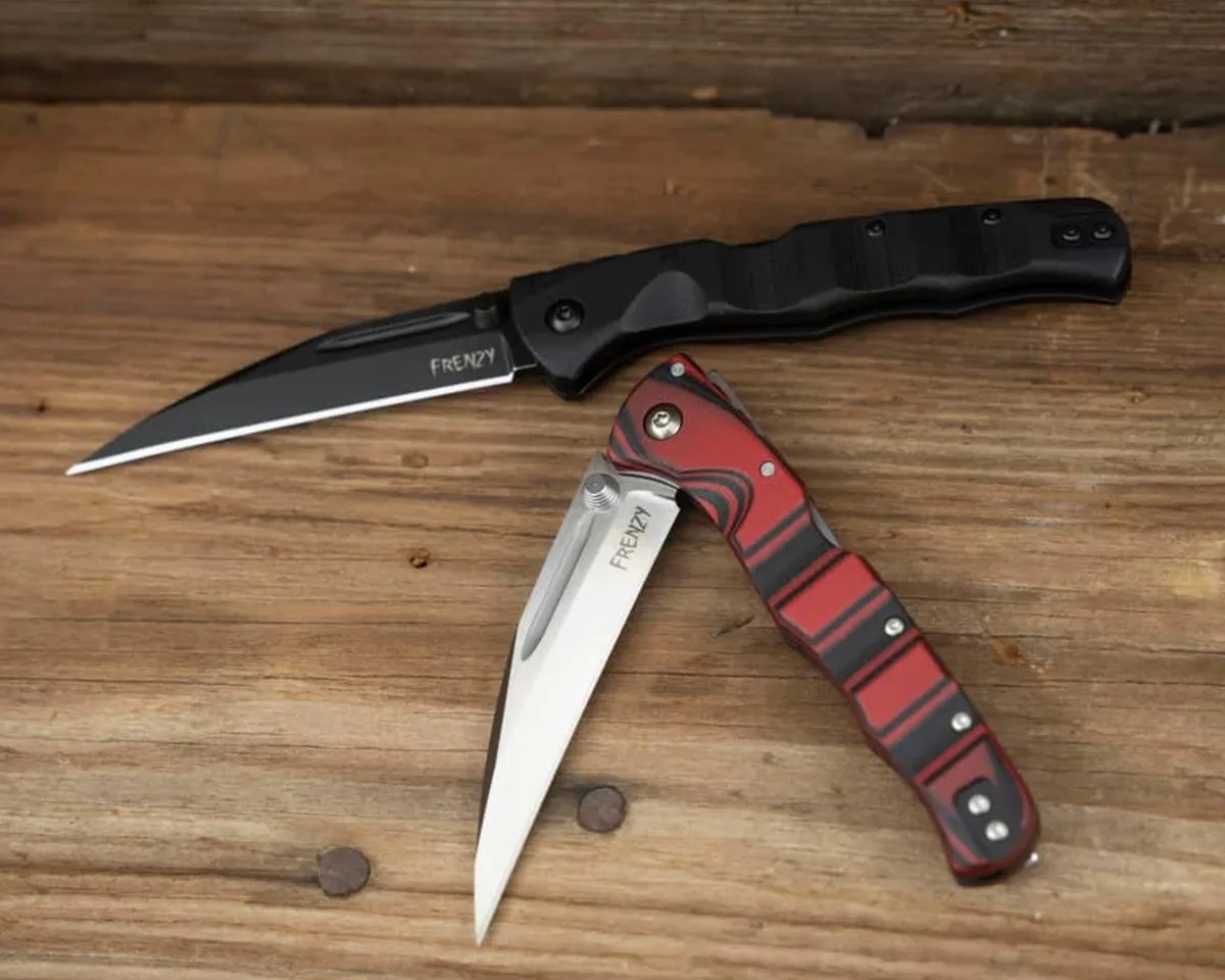 Cold Steel Frenzy II knives on wood table