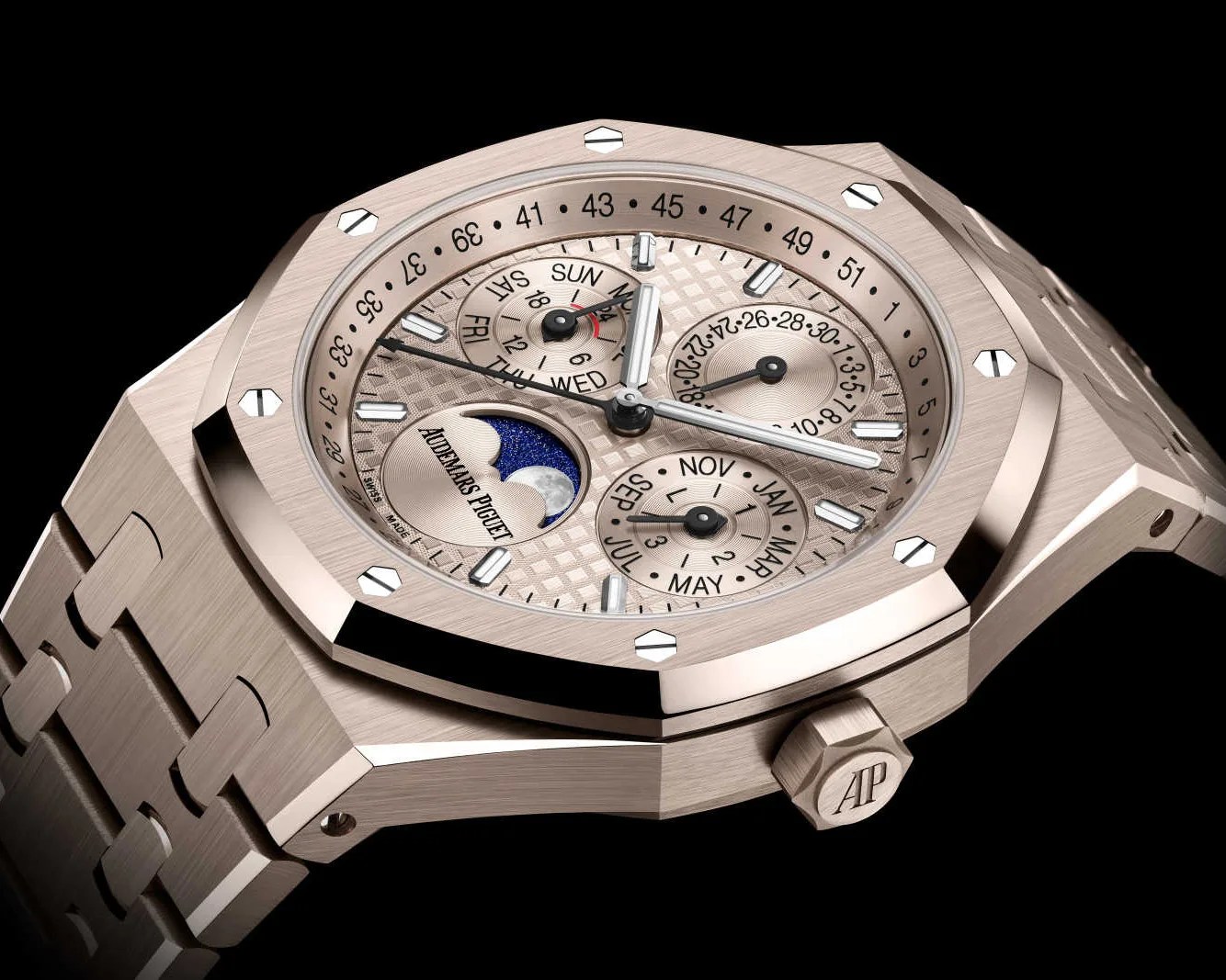 the dial of a Audemars Piguet rose gold perpetual calendar watch