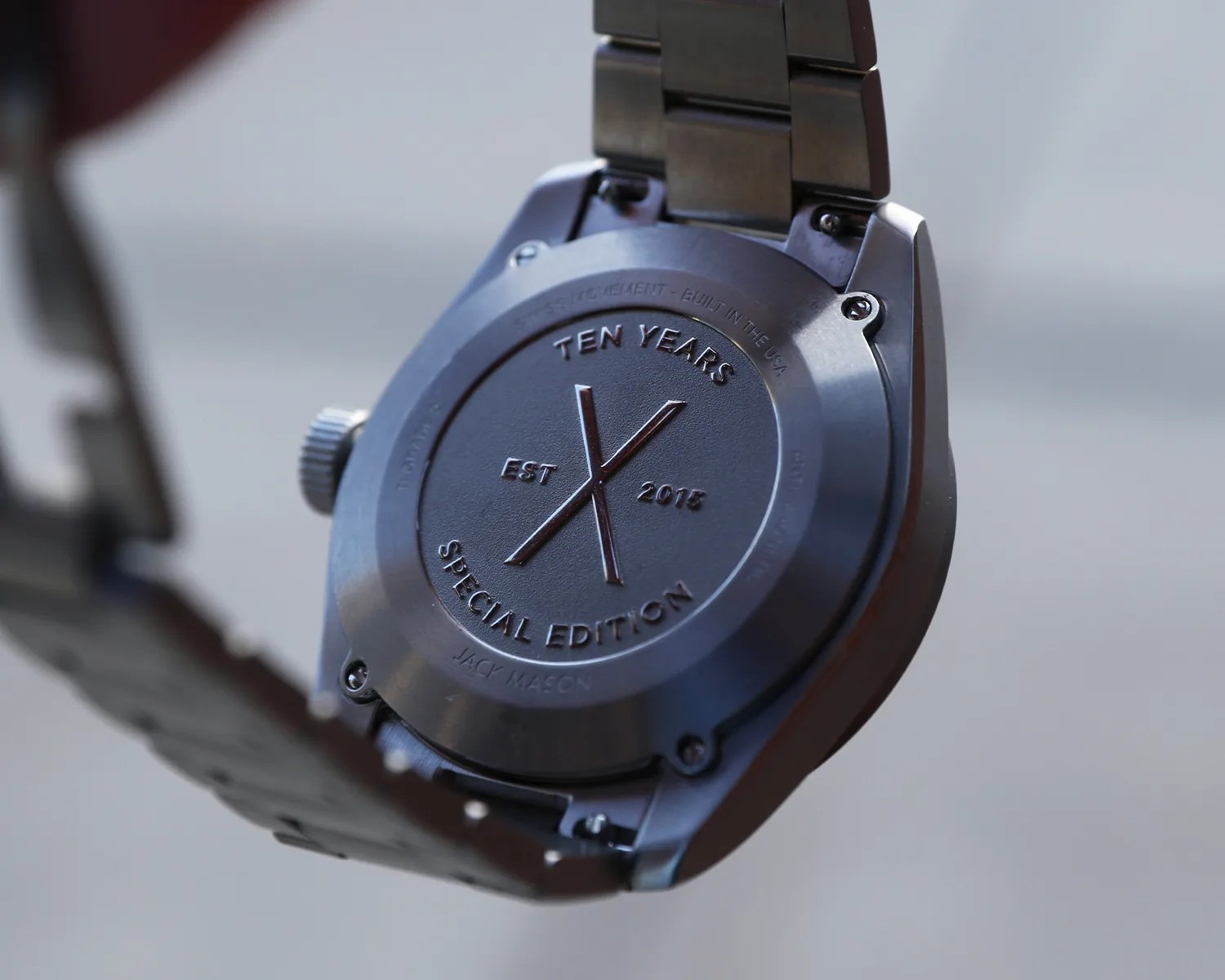 the caseback of a jack mason pilots watch