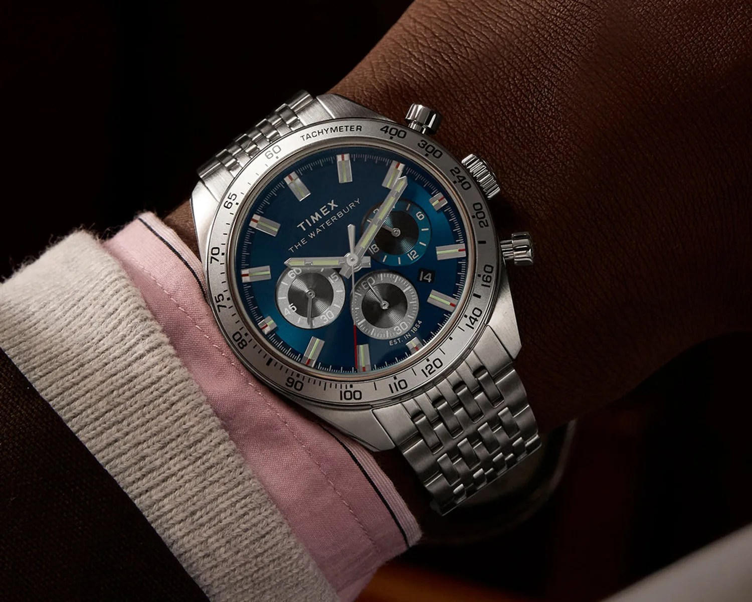 a timex chronograph watch on a mans wrist