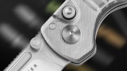 Closeup of Kizer Parakeet knife pivot