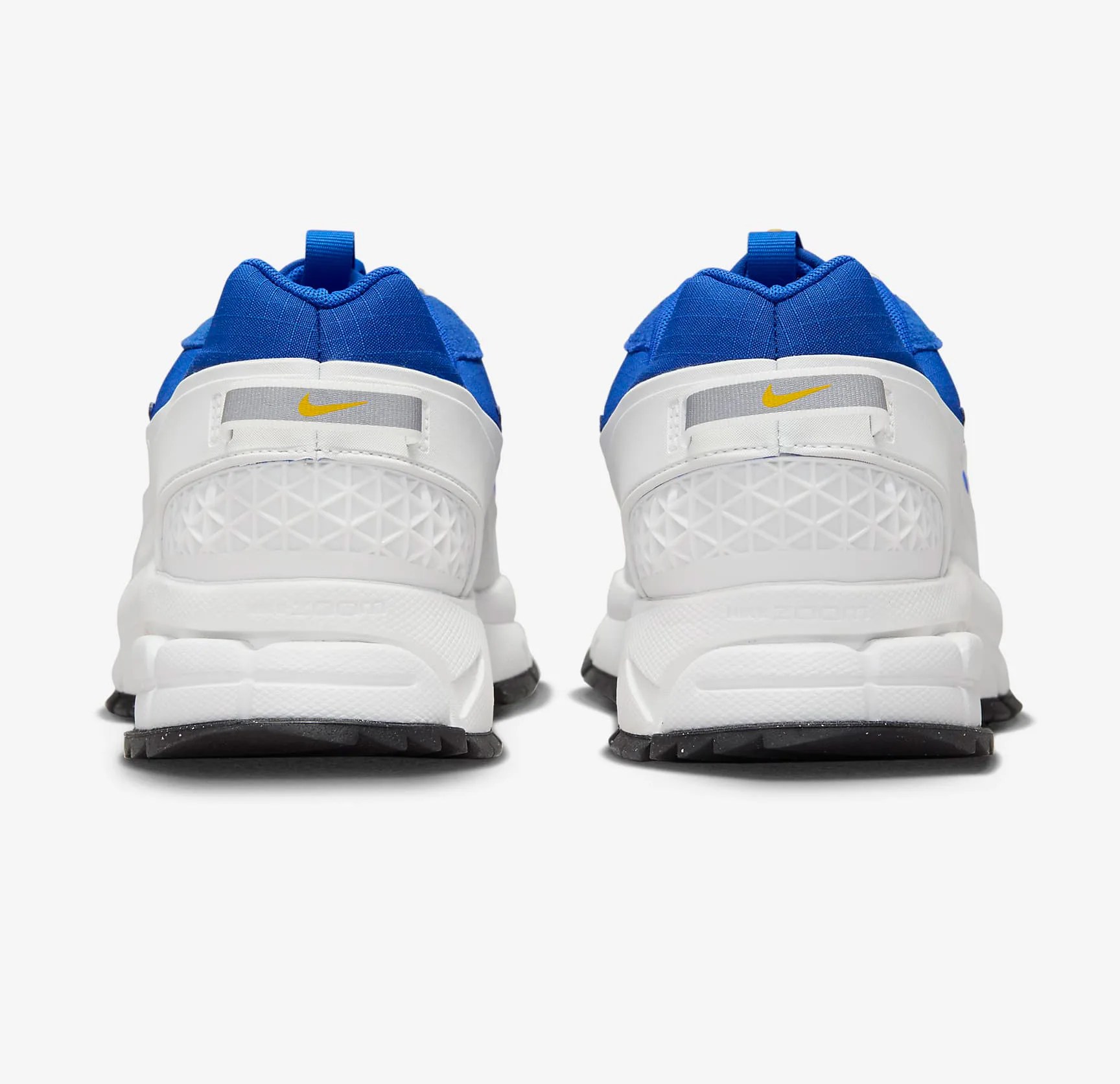 The heels of a pair of Nike Zoom Vomero Roam Sneakers 