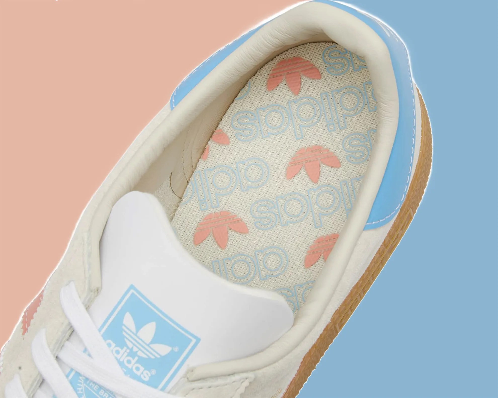 the inside heel of a white adidas sneaker