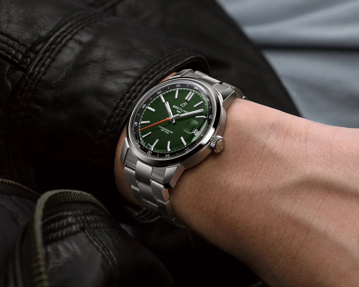 a breitling watch on a mans wrist