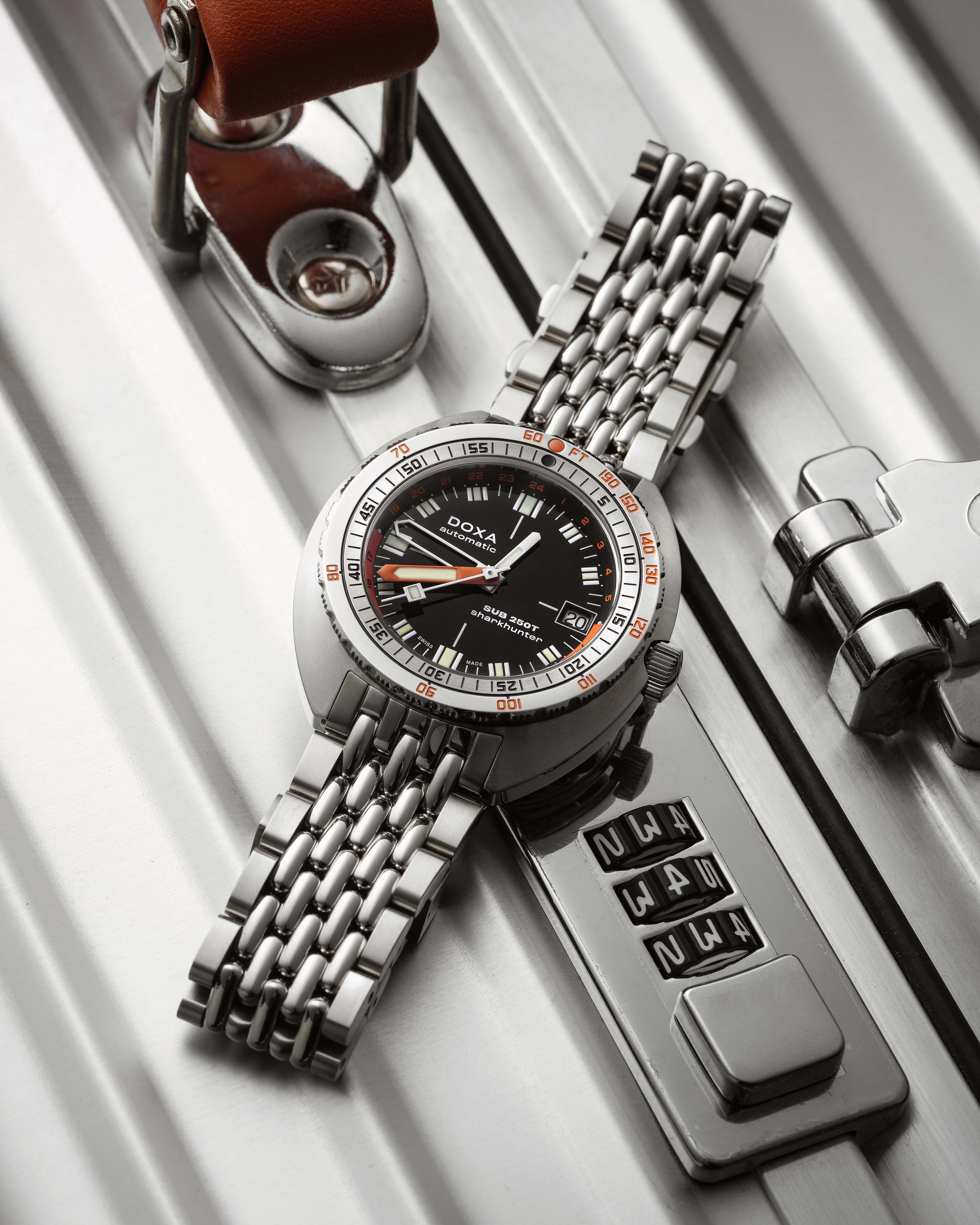 a black Doxa dive watch