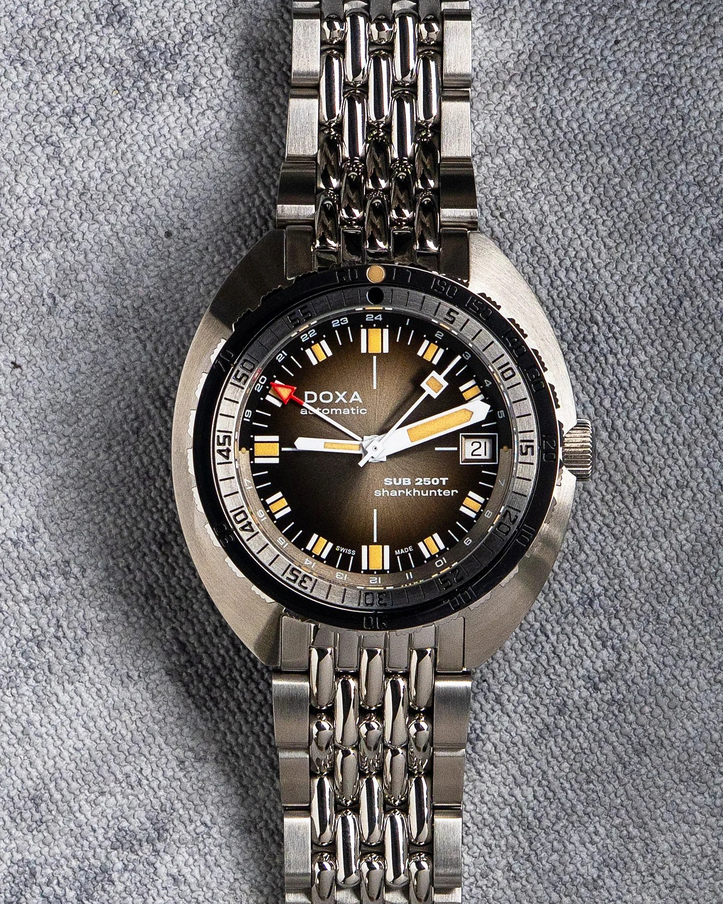 a gray Doxa GMT dive watch